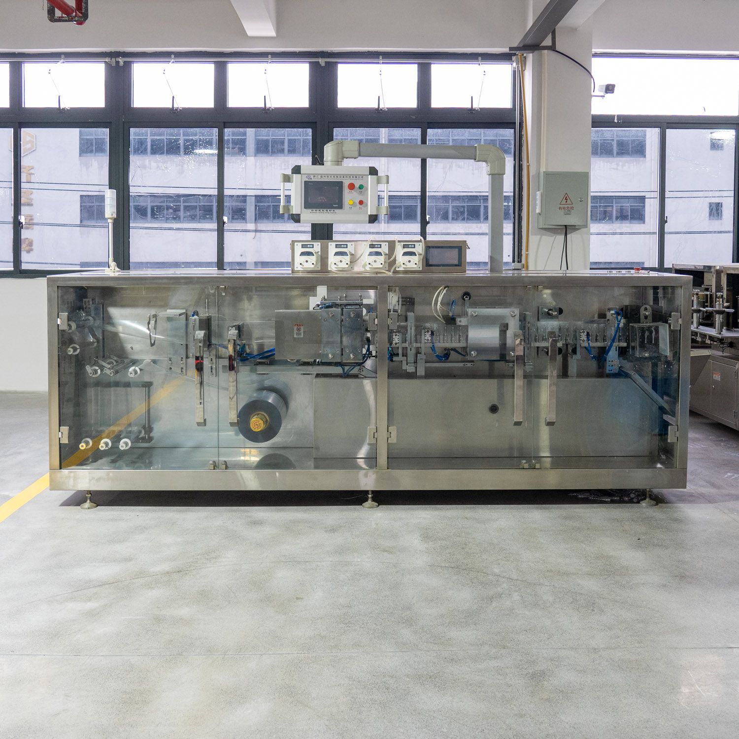 High-Performance PLC-Controlled Automatic Filling and Sealing Machine